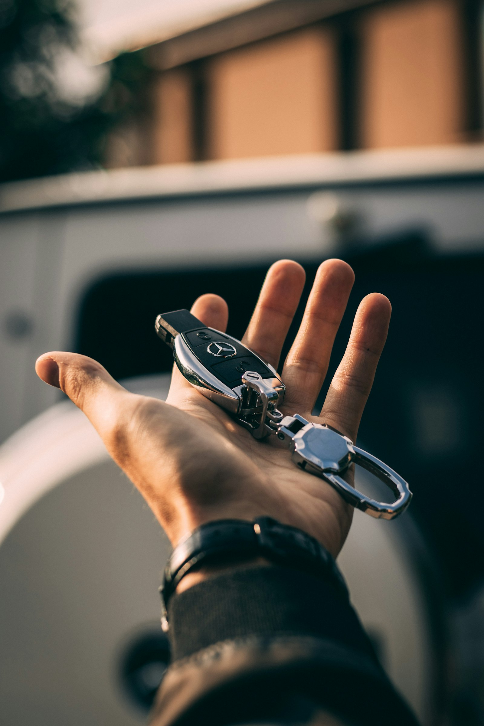 Modern car key in hand